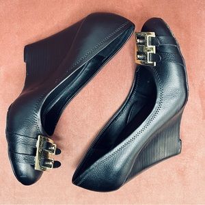 BCBG Paris Black wedges with gold trim front buckle rounded toe